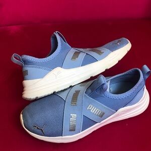 Little girl Puma tennis shoe baby and white